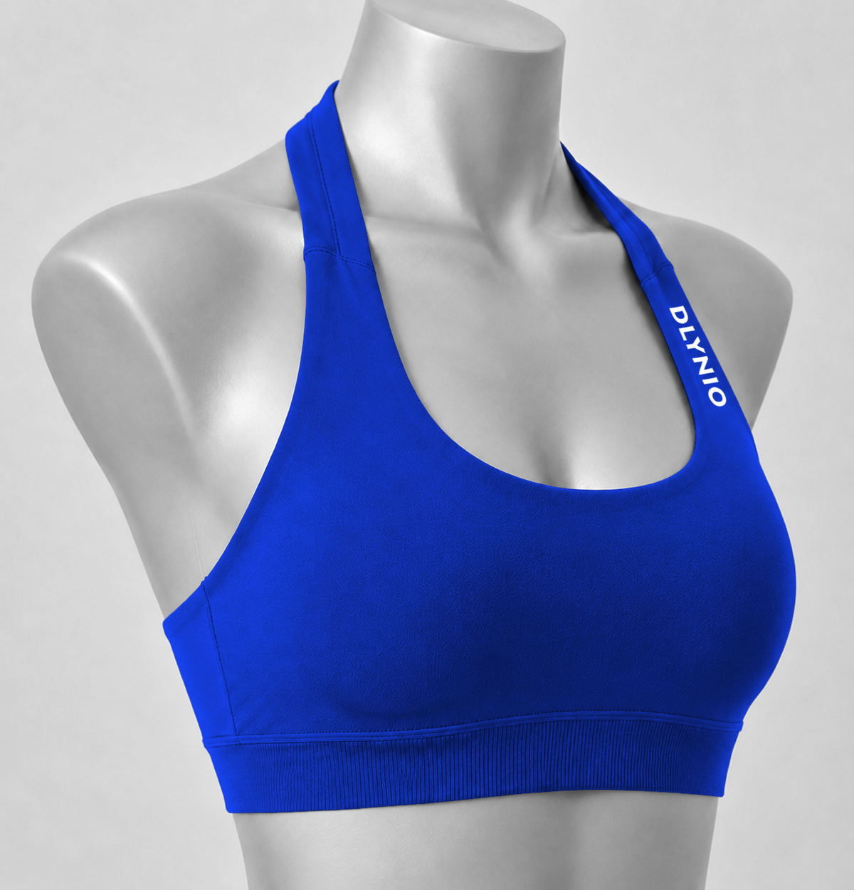 DLYNIO Deep Sea Blue halter sports bra, angled close-up view