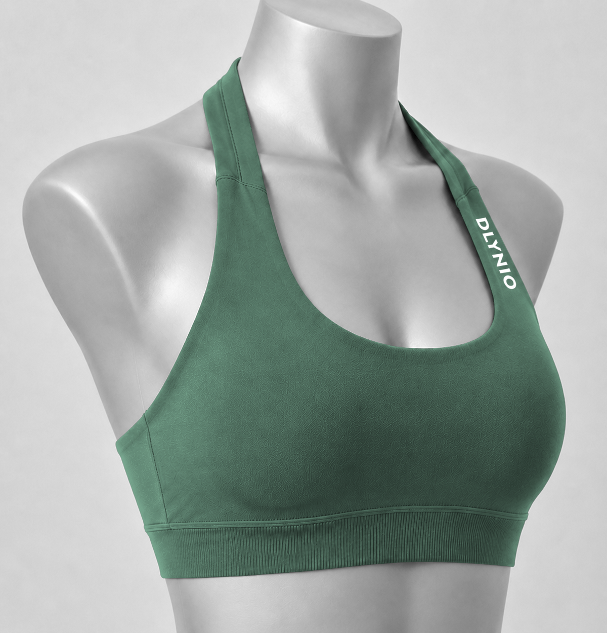 DLYNIO Pistachio halter sports bra, angled close-up view