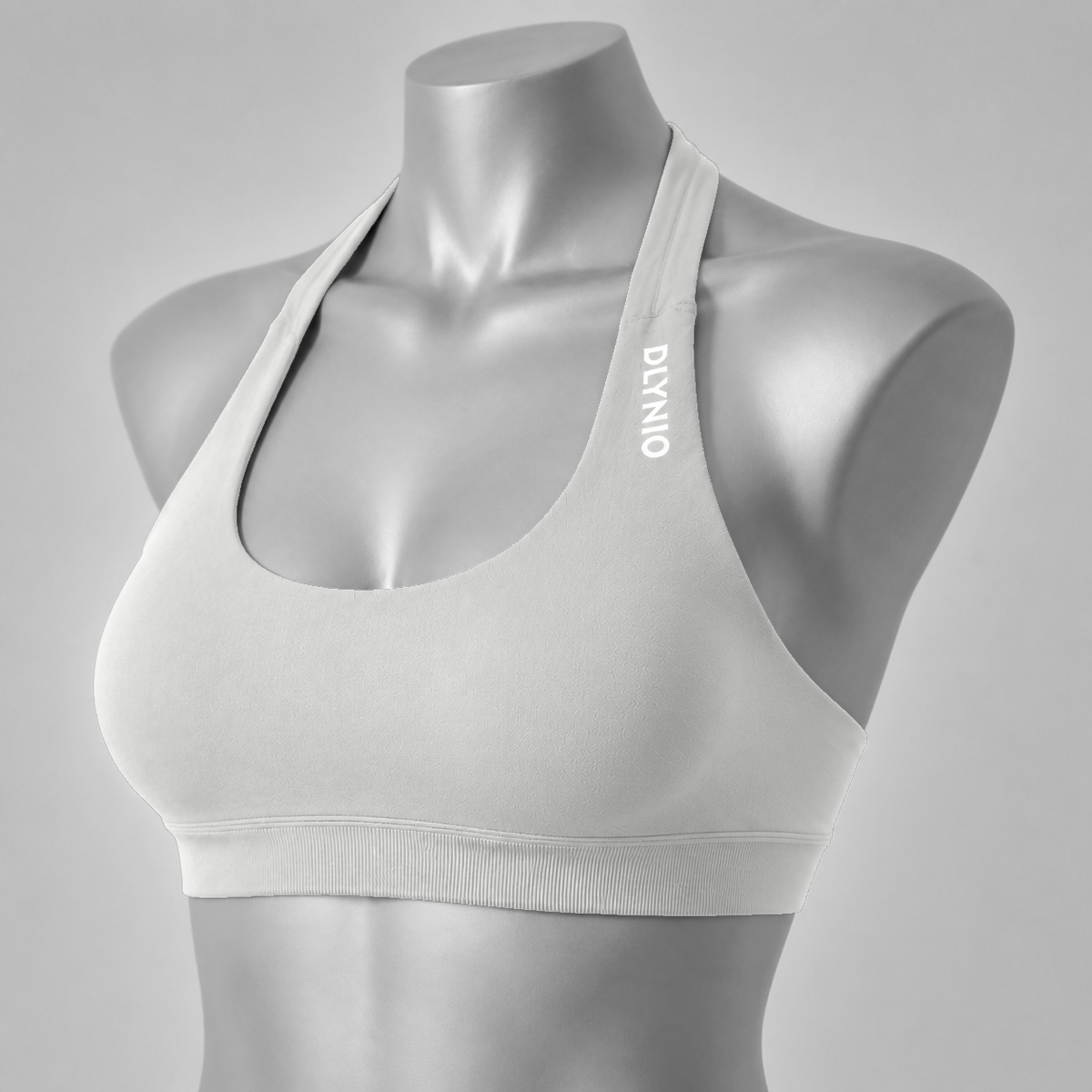 DLYNIO Feather Beige halter sports bra, angled front view
