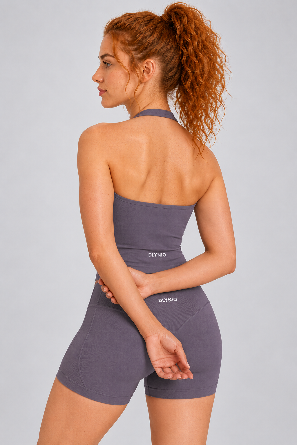 Impact Halter Top on model; shorts and accessories not included